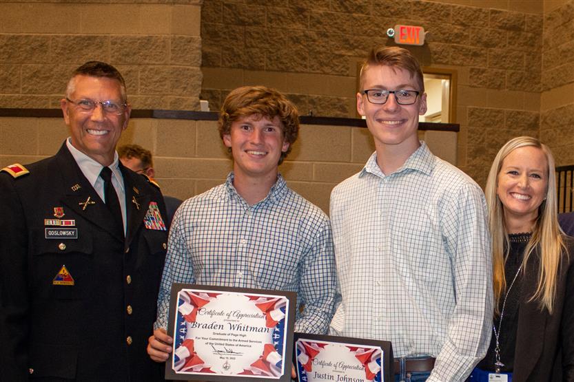 A student is honored for serving in the US Armed Forces after high school